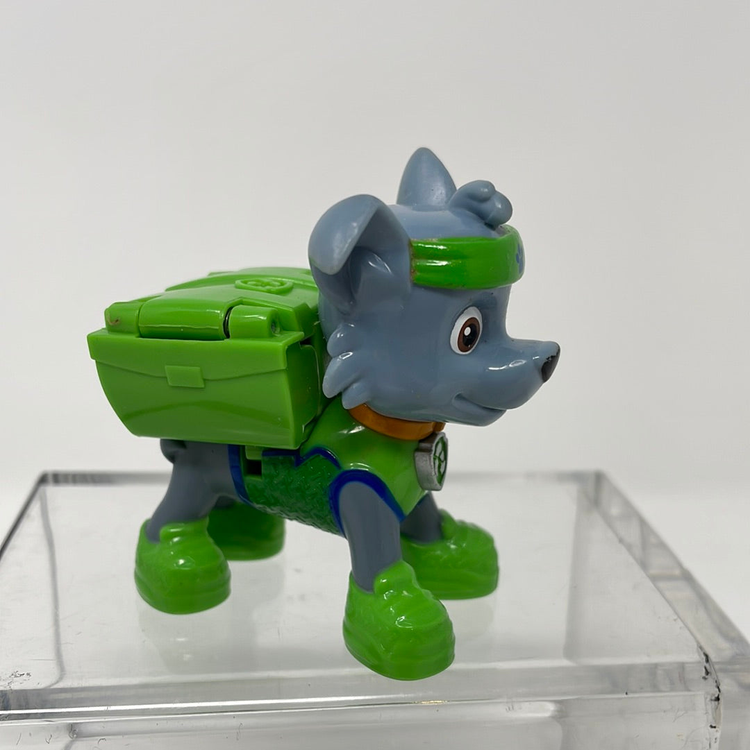 PAW Patrol, Rocky Action Figure with Clip-on Backpack and Projectiles 