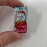 ZURU Surprise Mini Brands Crystal Light Wild Strawberry Metallic
