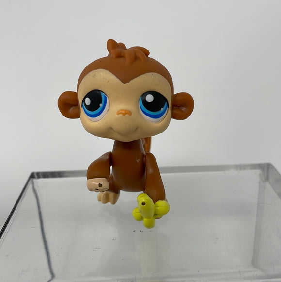 Littlest Pet Shop LPS #86 Monkey Brown With Blue Eye Magic Motion Eating Banana