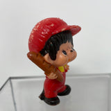1979 Monchhichi Sekiguchi with a loaf of bread