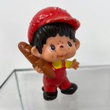 1979 Monchhichi Sekiguchi with a loaf of bread